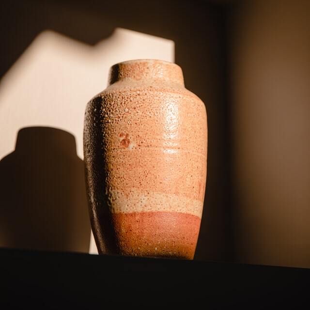 An urn containing ashes of a deceased person after the Cremation Service
